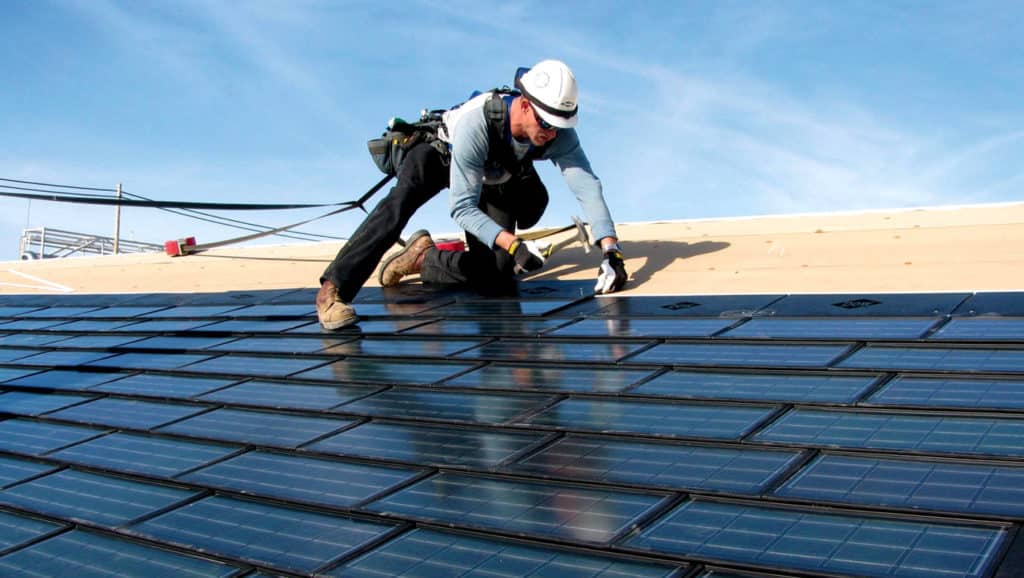 Person-Installing-A-Solar-Shingle