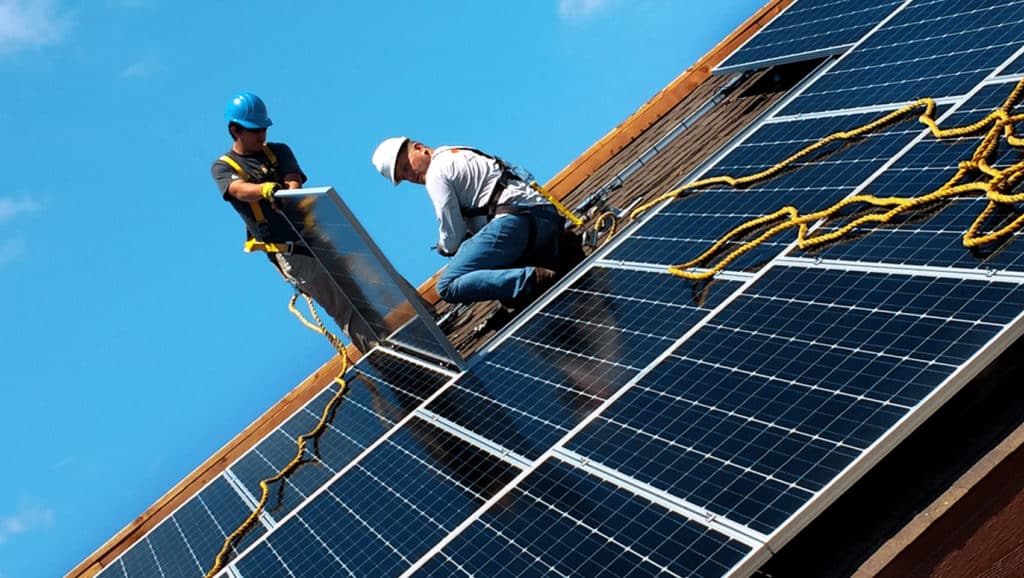 Employees-Working-On-Solar-Panel-Installation